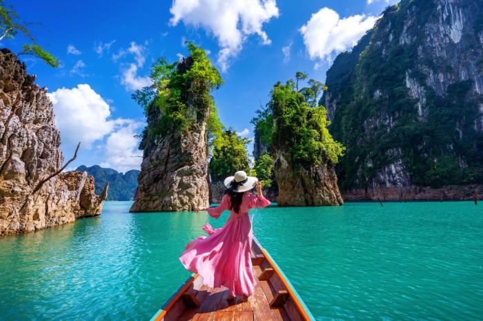 Explore the world with Suhaani Sair, beautiful girl on a boat admiring the beauty of nature